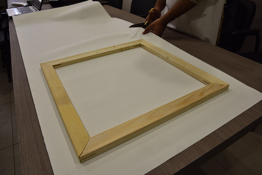 Measure canvas for stretcher bars