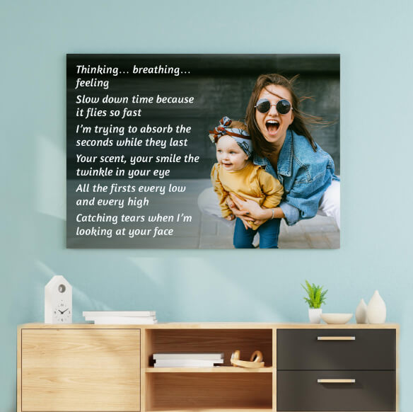 Canvas print of a smiling woman and toddler with a sentimental poem overlay.