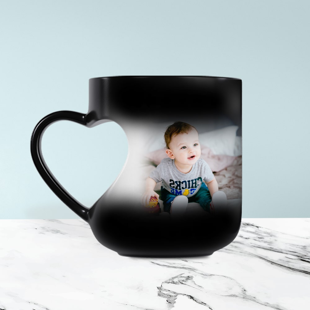 Cut heart handle black magic mug