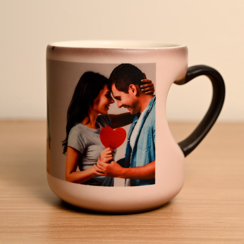 Cut heart handle black magic mug