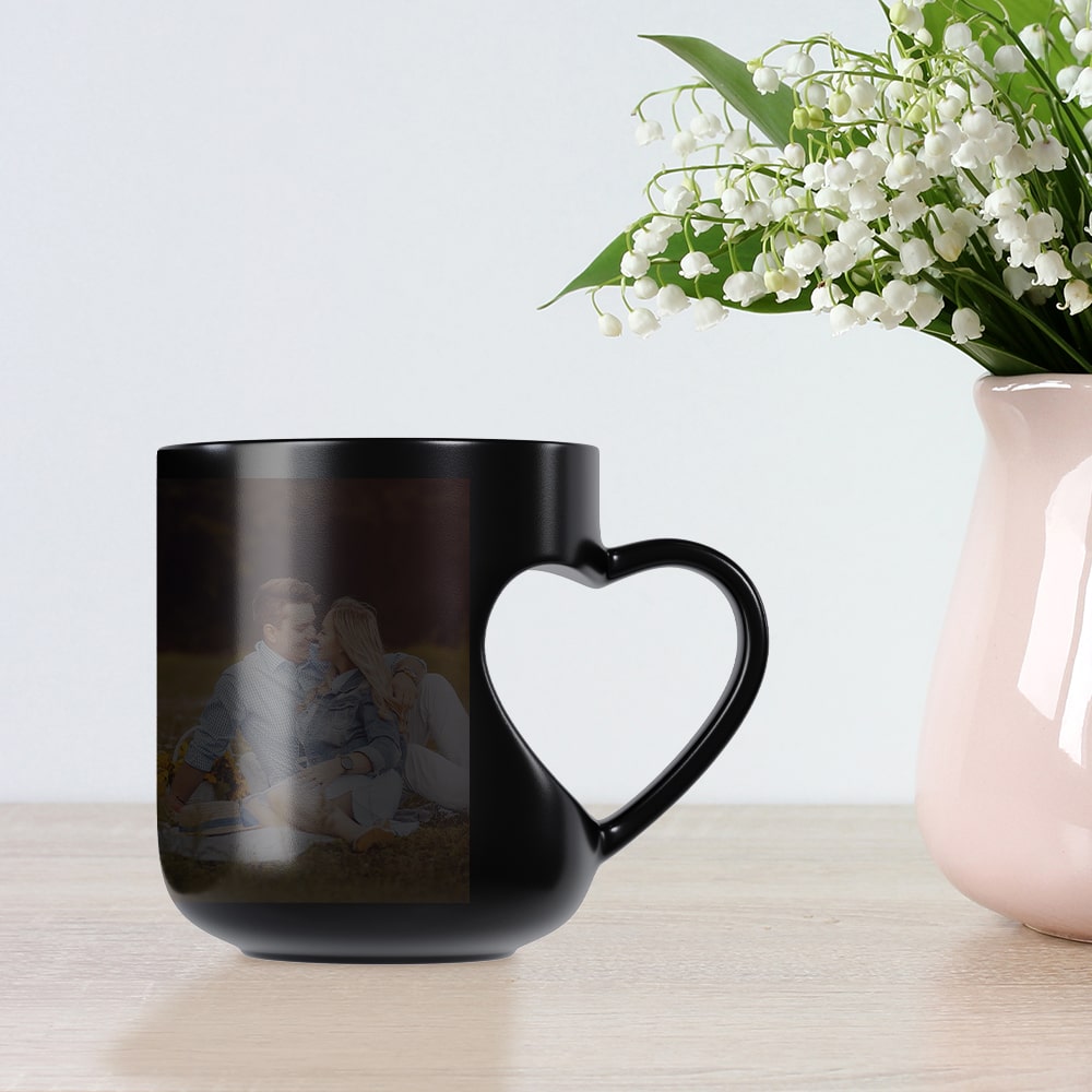 Cut heart handle black magic mug