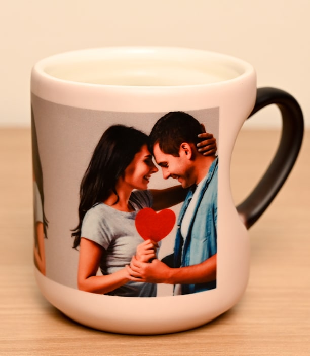 Cut heart handle black magic mug